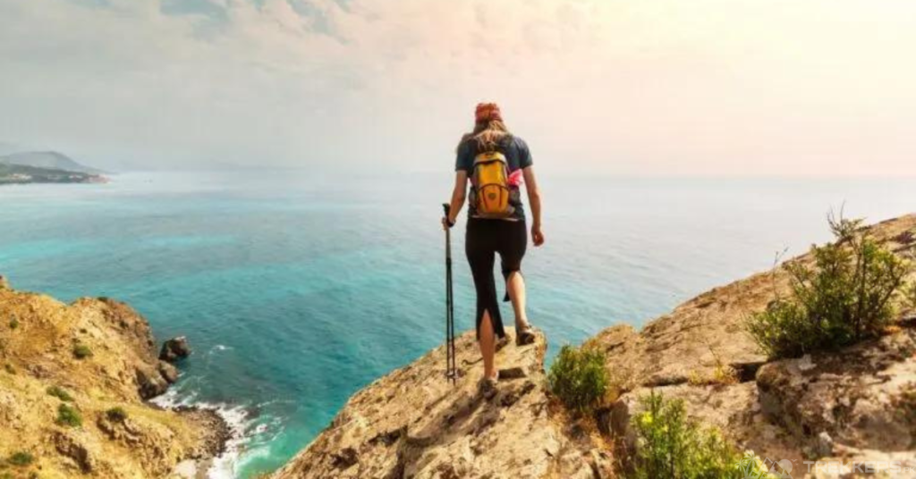 a-hiker-standing-on-rock