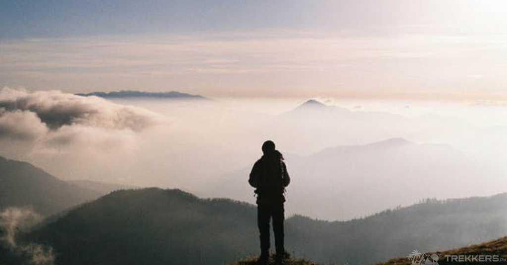 a-man-standing-on-a-high-mountainous-area