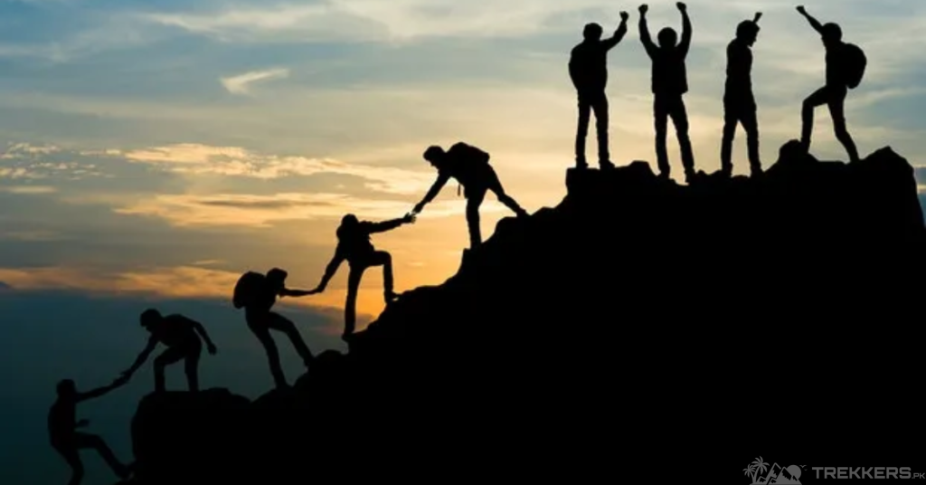 climbers-helping-each-other-to-the-top
