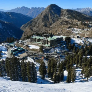 Breathtaking panoramic view of Malam Jabba Ski Resort, the Pearl Continental hotel, and snow-capped peaks.
